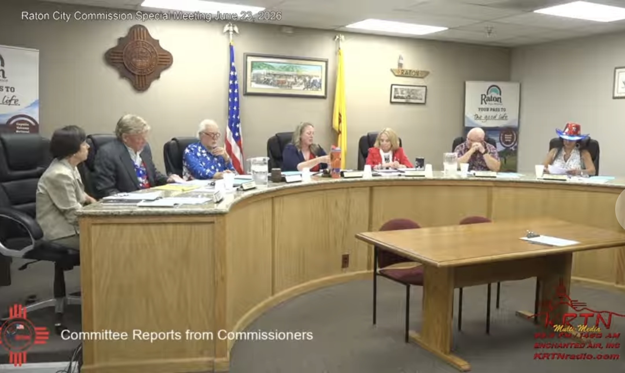 Seven people seated at the dais during a Raton City Commission special meeting on June 23, 2026.